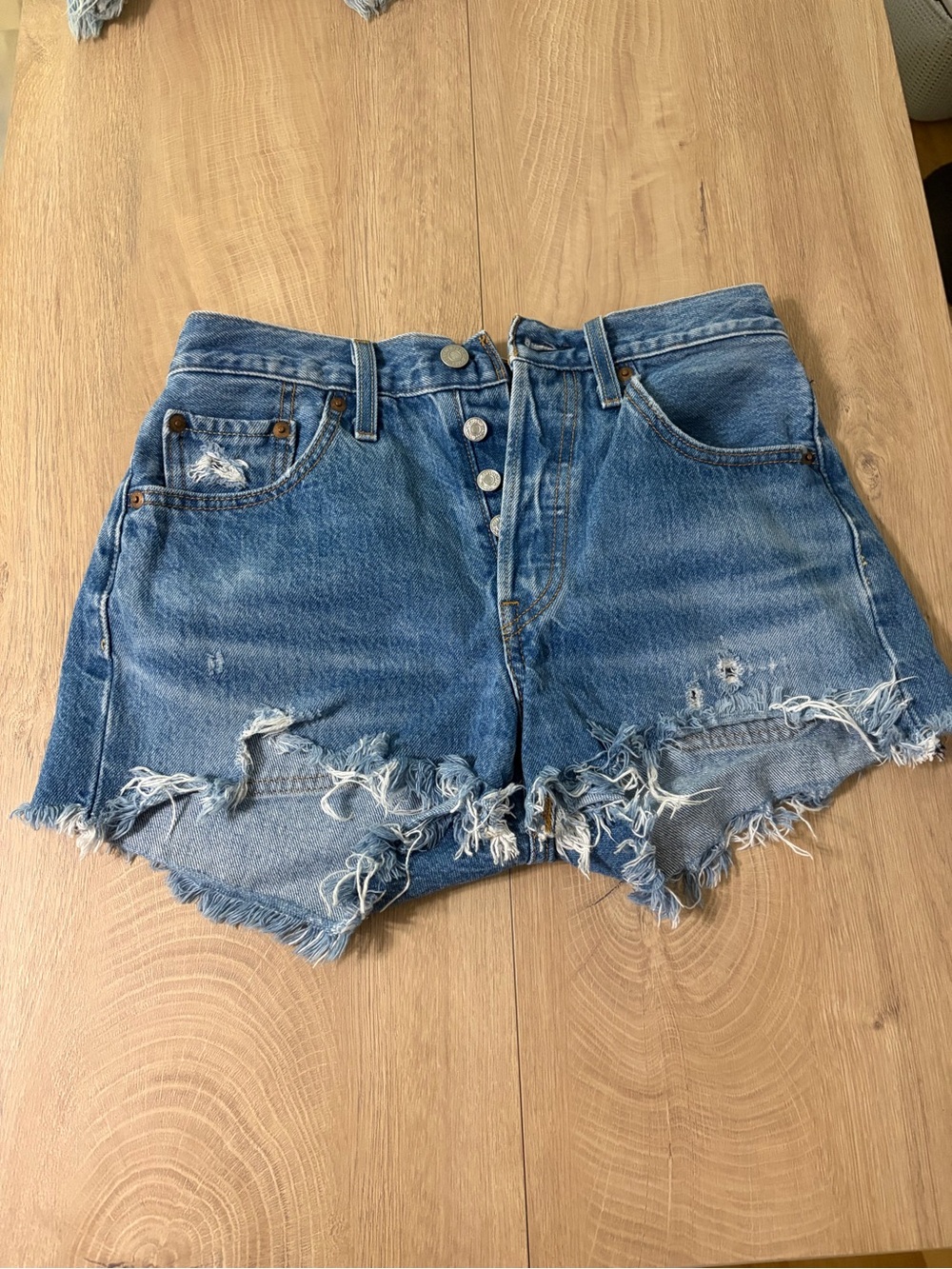 Levi’s 501 High-Rise Distressed Denim Shorts in Blue